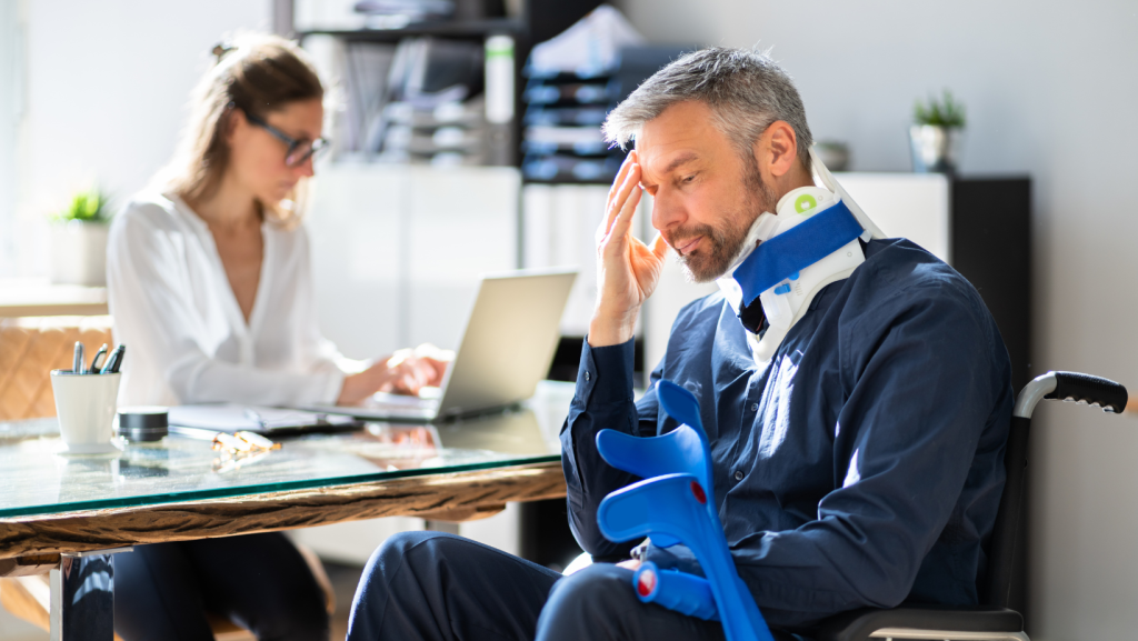 How MRIs help a personal injury case showing injured man consulting with legal team